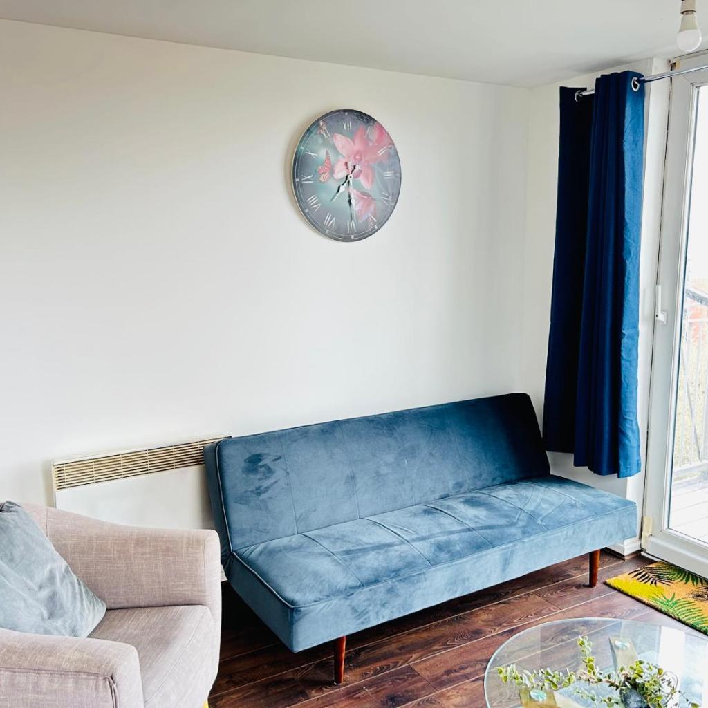 Photograph of Comfortable 2-Bedroom Flat close Etihad and Coop Live