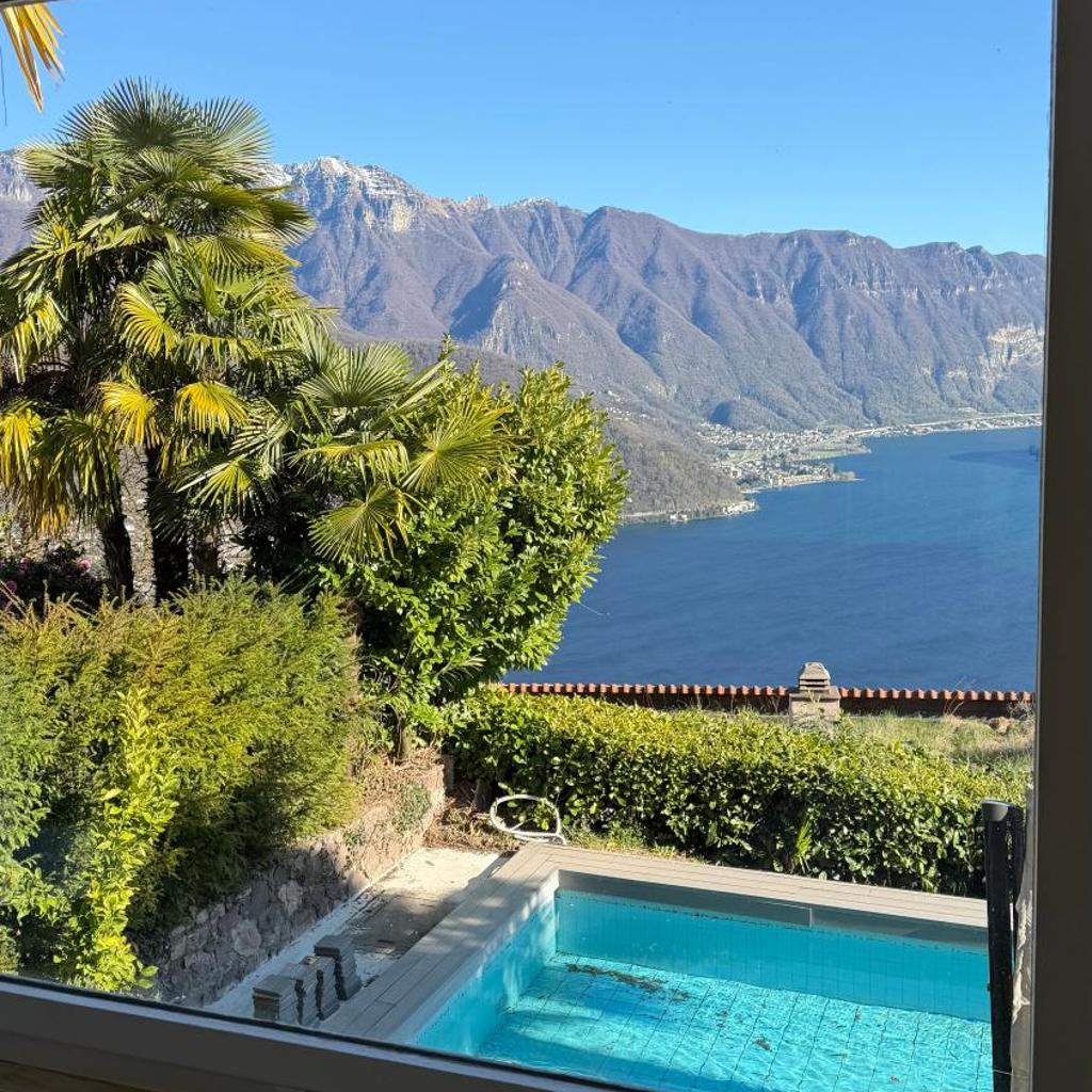 Image 26 - Villa Martino pool and lake view