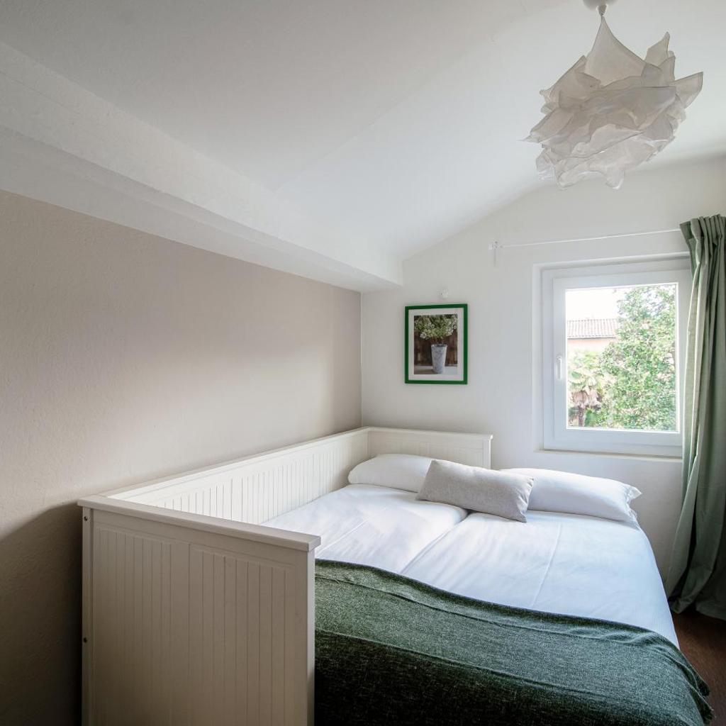 Image 25 - Mansarda Verde by Quokka 360 - Cozy Attic Apartment with Lake View