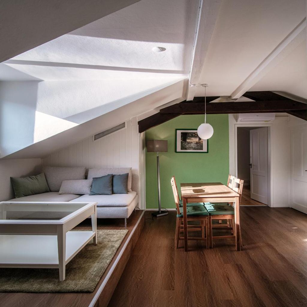 Image 2 - Mansarda Verde by Quokka 360 - Cozy Attic Apartment with Lake View