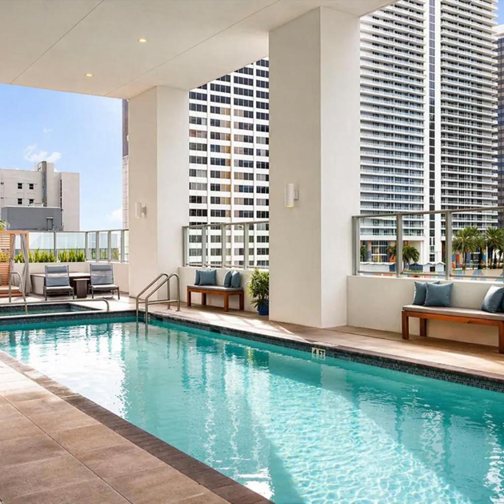 Photograph of Stylish Retreat with Pool, Gym, Lounge and Private Balcony