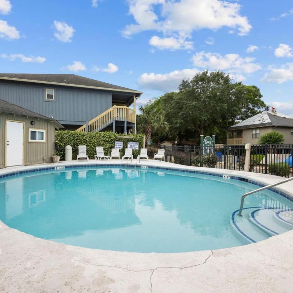 Photograph of Nostalgic Beach Cottage. Unplug near beach with pools