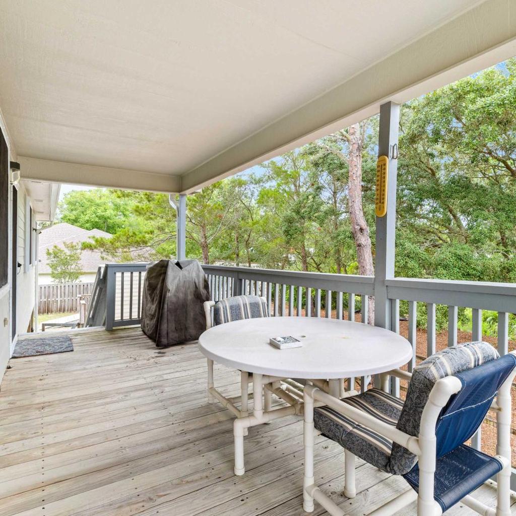 Photograph of 5BR Home Located on Canal Backyard with Deck and BBQ