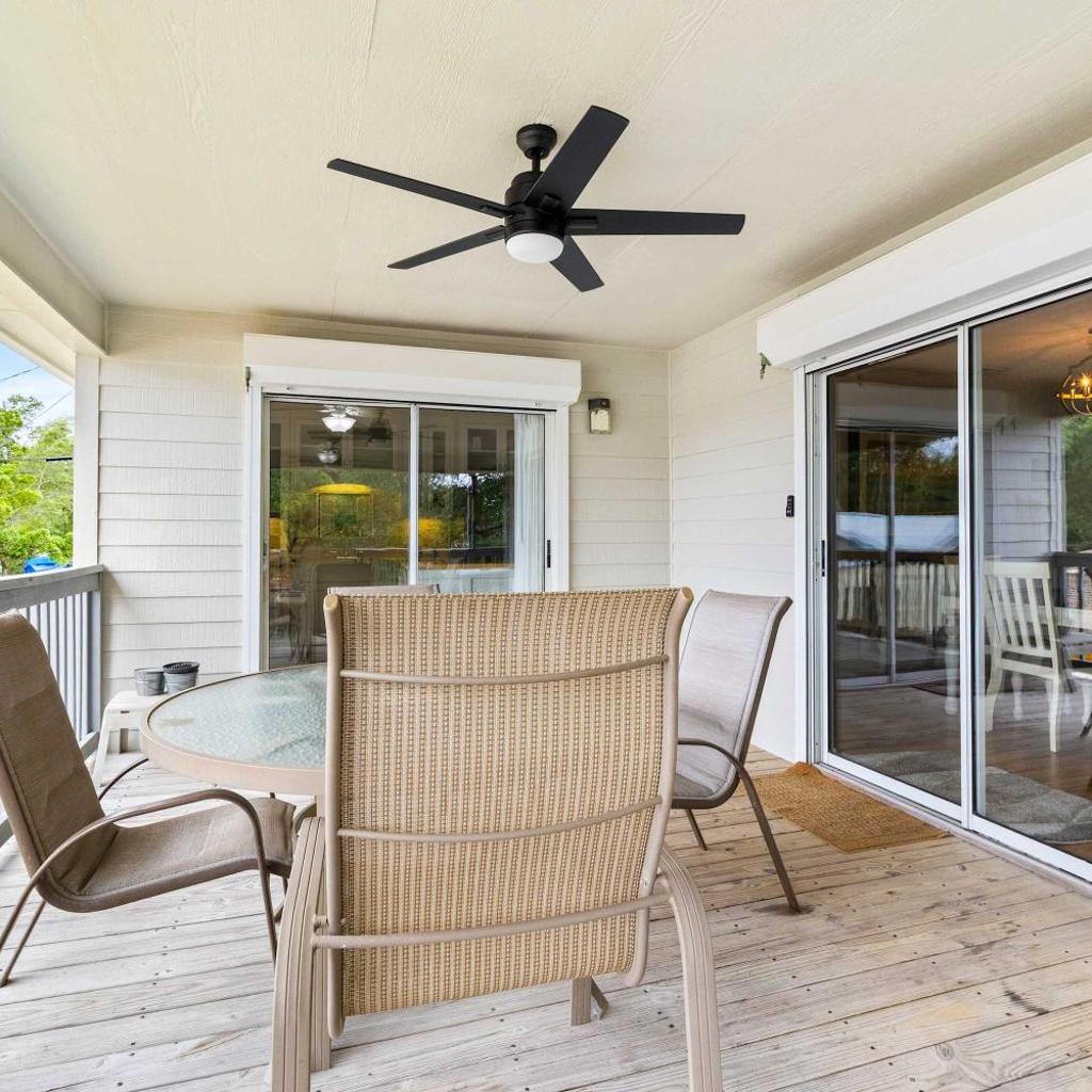 Photograph of 5BR Home Located on Canal Backyard with Deck and BBQ