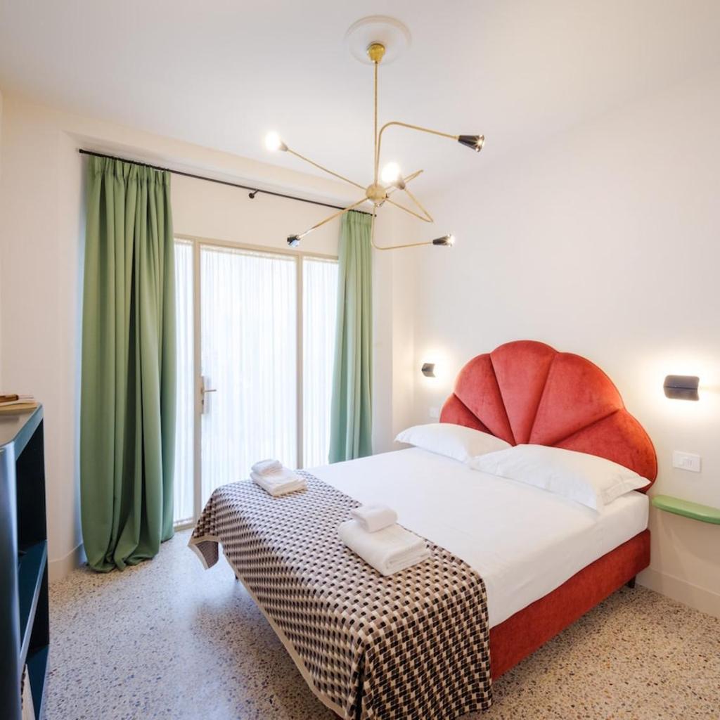 Photograph of Chicco - Modern Two-Bedroom in a Green Courtyard