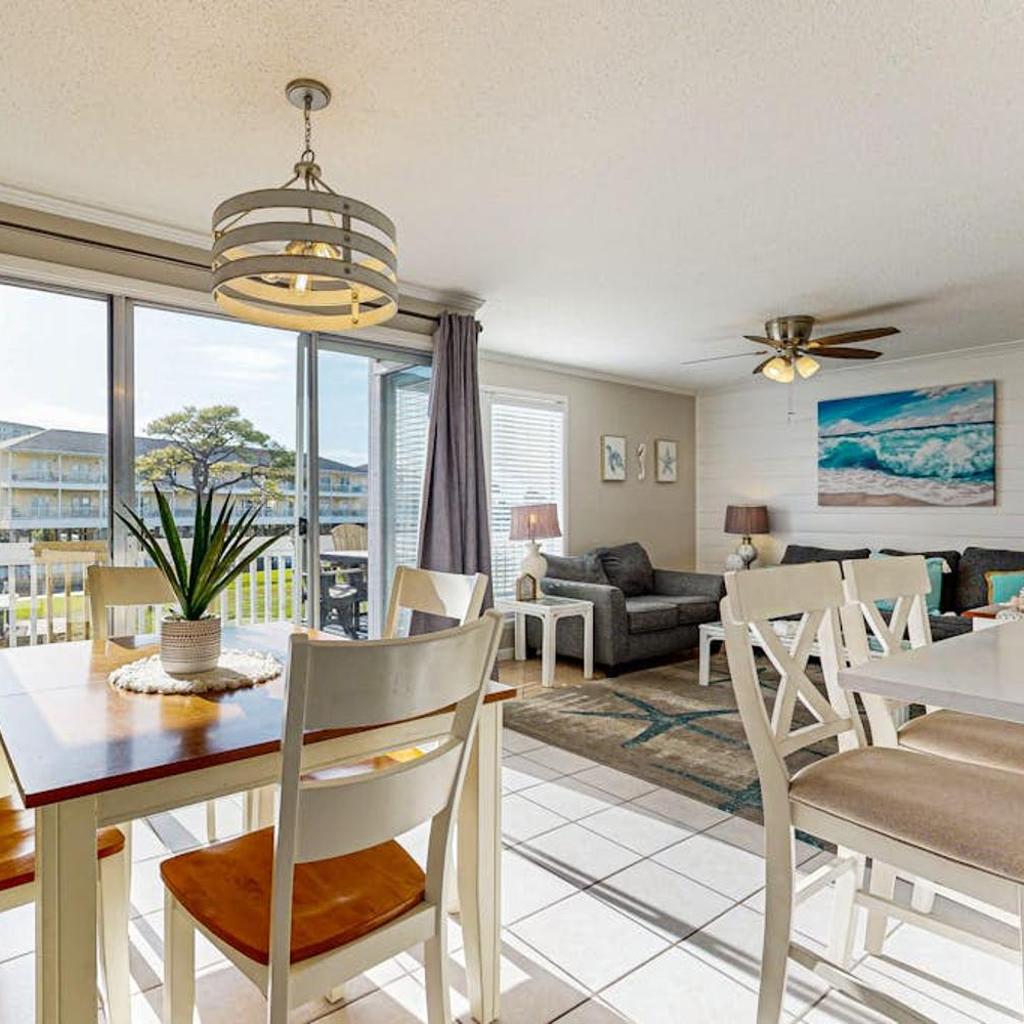 Photograph of Inviting condo with dock pool hot tub & private beach - dog-friendly