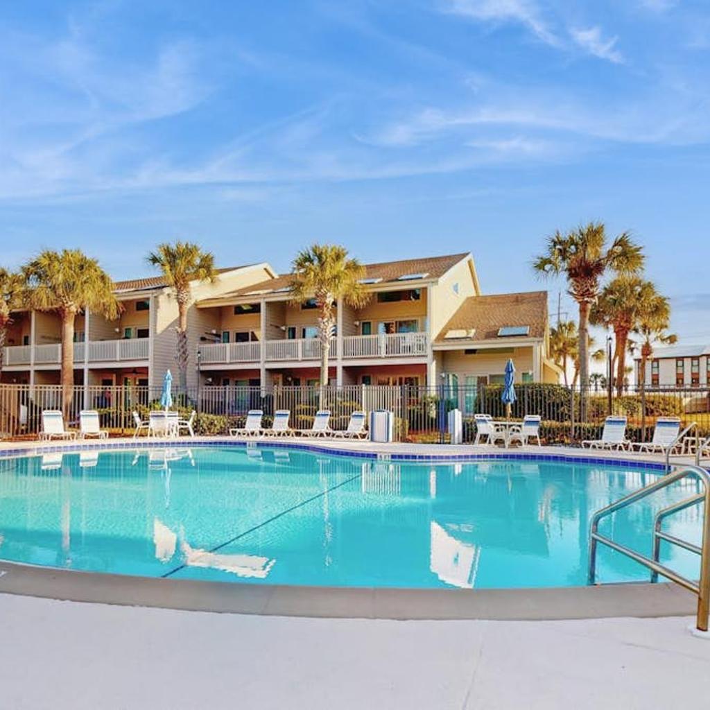 Photograph of Spacious pet-friendly villa with full kitchen shared pool & private beach access