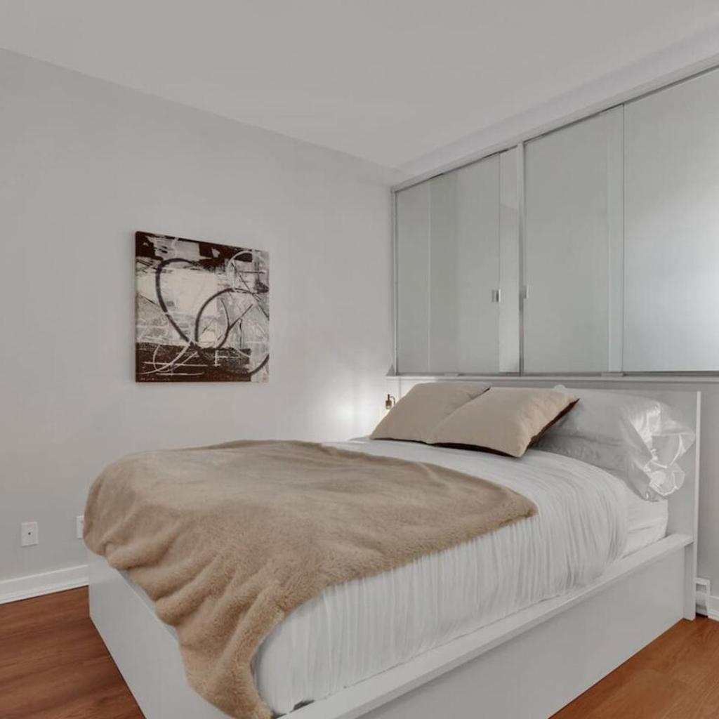 Photograph of Downtown Van 1BR Stay - Balcony and Workspace