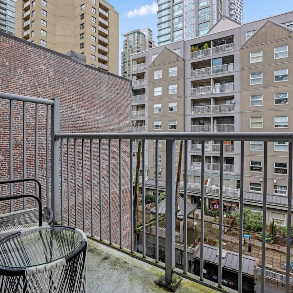 Photograph of Downtown Van 1BR Stay - Balcony and Workspace