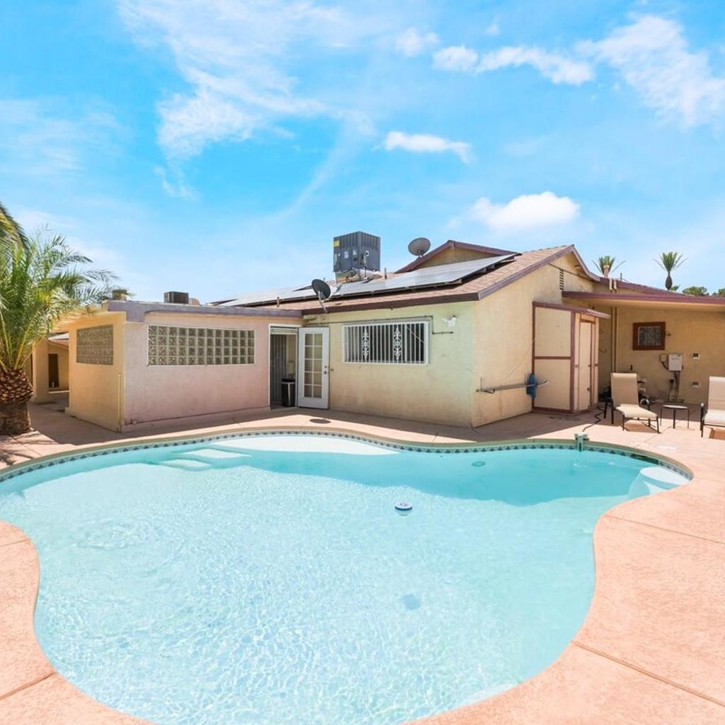 Photograph of NEW 5BR Home Pool BBQ 8 min to Strip