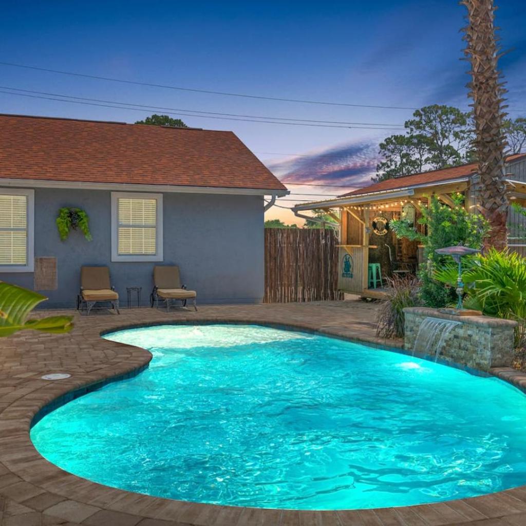 Photograph of Shipwrecked - Private Pool Home, Game Room, 5 Min to Beach, Pets OK, & More!