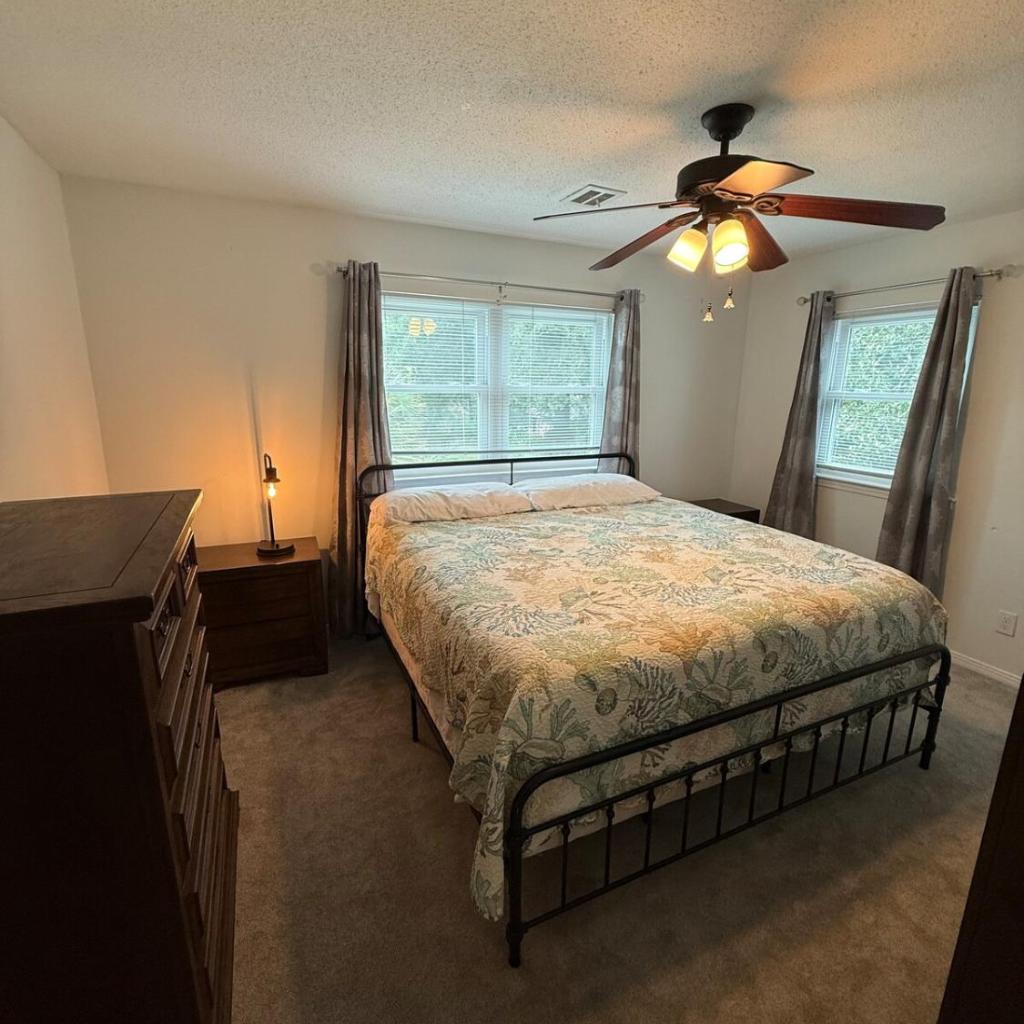 Photograph of Spacious Private King Bedroom in Pensacola with Kitchen