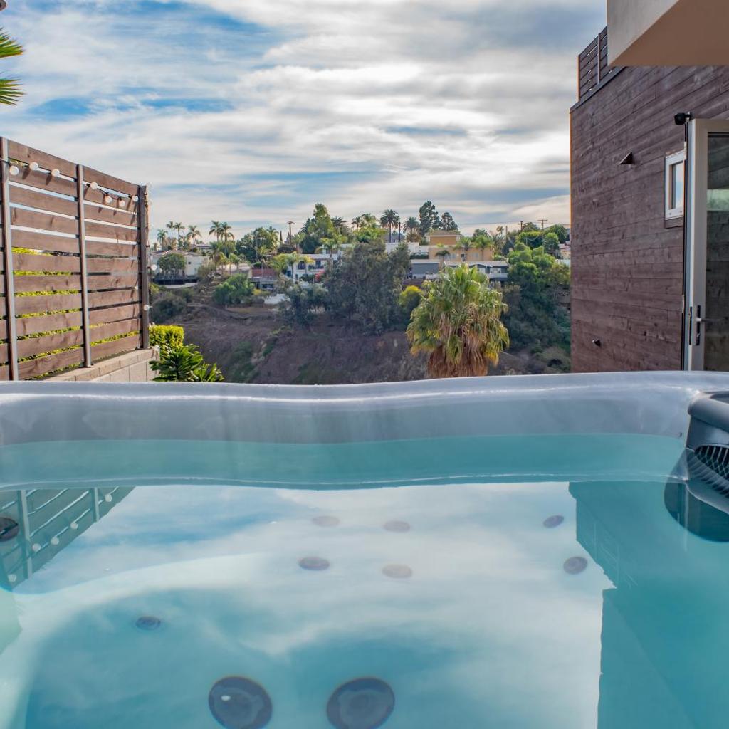 Photograph of Modern Hillside Oasis with Jacuzzi & Ocean Views