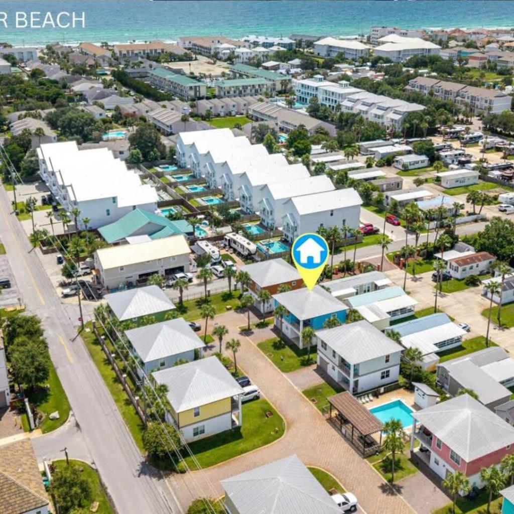 Photograph of Walk to Beach - Golf Cart - Pool - Air Hockey - BBQ