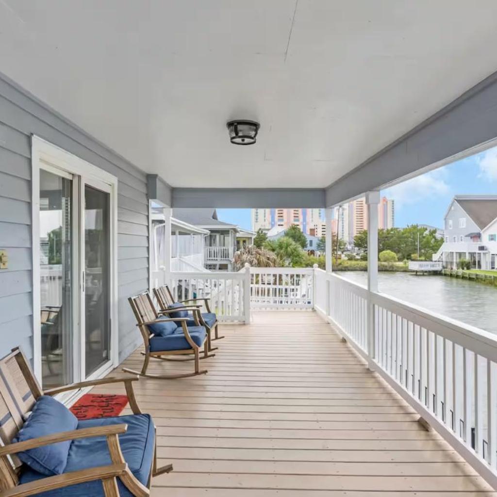 Photograph of 6BR Waterfront Home Private Pool & Dock