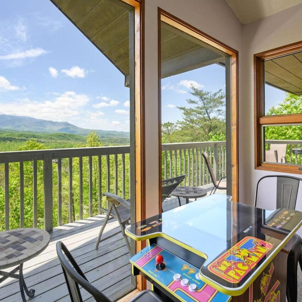 Photograph of Access to 3 pools & pickleball! View! Shuffleboard! Arcade! Hot Tub!