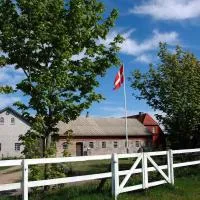 Nordkap Farm Holiday & Hostel, отель в городе Биндслев