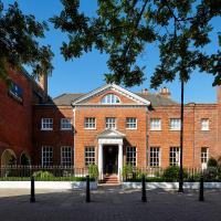 a large red brick building with a door at Sir Christopher Wren Hotel, Windsor