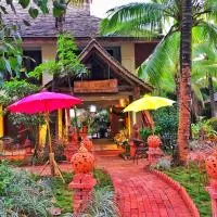 Xishuangbanna Elephant Home Guesthouse, hotel en Jinghong