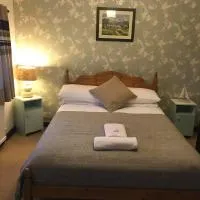 New Gurkha Inn, готель у місті Талгарт