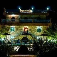 Riad Aslda، فندق في أسني