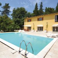 a swimming pool in front of a house at Villa Fiore, Castelnuovo di Porto