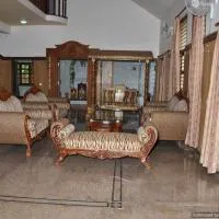 Suvarna Luxury Home Stay, Hotel in Mysore