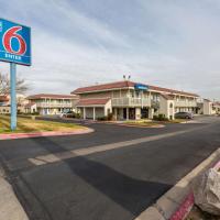 a sign for a hotel on a street at Motel 6-El Paso, TX - East