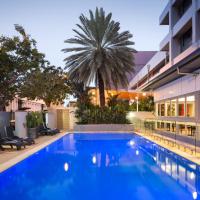 an image of a swimming pool in front of a building at H on Smith Hotel, Darwin