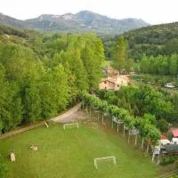 Càmping Molí de Vilamala, хотел в Лес Планес д'Остолес