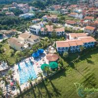 an aerial view of a resort with a pool at Morfeas Hotel, Kavos