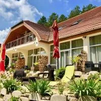 Napkelte Vendégház, hotell i Orfű