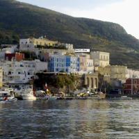 a group of buildings and boats on the water at Hotel La Baia, Ponza