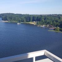 a view of a river from a cruise ship at Studio mit Seeblick, Bad Segeberg