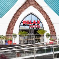 a view of the facade of a building with a sign at Relax Hotel Casa Voyageurs, Casablanca