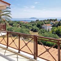 a balcony with a view of the ocean at Sea View Maisonette close to Neos Marmaras, Lagomandra