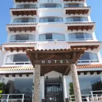 Hotel 9 Manantiales، فندق في تشيغناهوابان