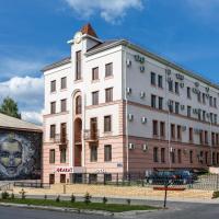 a building with a face painted on the side of it at Hotel Karat, Kazan