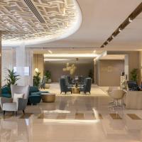 Two Seasons Hotel & Apartments, hotel v okrožju Dubai Internet City, Dubaj