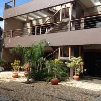 Residencial La Ferrugem - Pe na Areia, hotell i Garopaba