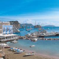 a group of boats are docked in a harbor at Hotel Gennarino A Mare, Ponza