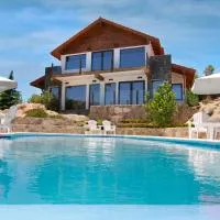 Suites de la Colina โรงแรมในลากุมเบรซิตา