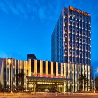 Wanda Realm Qiqihar, hotel cerca de Aeropuerto de Qiqihar Sanjiazi - NDG, Qiqihar