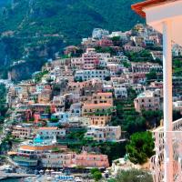 a view of a town on the side of a mountain at Hotel Marincanto, Positano