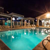 a pool at a hotel at night at Quality Inn Near China Lake Naval Station, Ridgecrest