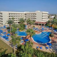 an overhead view of a hotel with a large swimming pool at Nissiana Hotel & Bungalows, Ayia Napa
