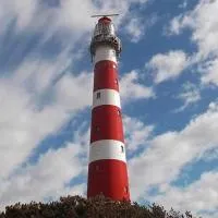 AMELAND-Appartementen " 't STRANDHUYS" en "DE VUURTOREN", Verwarmd ZWEMBAD, eigen KEUKEN, Zonnig TERRAS nabij DORP, DUINEN en STRAND, ξενοδοχείο σε Hollum