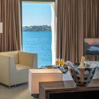 a hotel room with a view of the ocean at Bellevue Superior City Hotel, Šibenik