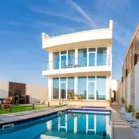 Sunrise Villas, Hotel in Al Sharqiyah