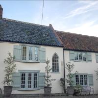 Holly Lodge Boutique B&B, hotel in Thursford